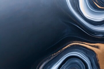 Top-down view captures abstract black marble textures with swirling epoxy-like patterns set against a clean white background, featuring ample copy space