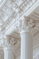 Fototapeta premium Close-up of ornate white Corinthian columns supporting intricate ceiling cornice with natural light