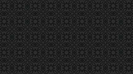 Intricate gray geometric pattern with repeating quatrefoil and floral shapes