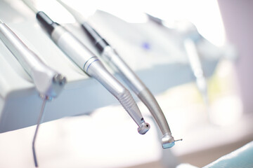 Portraits of doctor and patient in dentist's office. Shallow DOF. Developed from RAW; retouched...