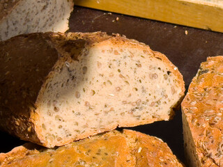 Sliced multigrain bread with seeds in sunlight
