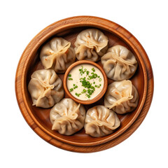 Fototapeta premium Dumpling momos with sauce in a wooden plate top view isolated on transparent white background, clipping path