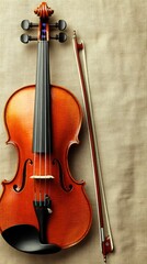Fototapeta na wymiar Elegant classical violin with bow on light textured background suitable for music, instrument, performance, or education themes