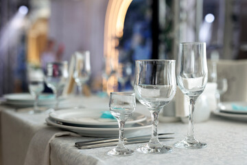 Setting the table at a festive banquet in a restaurant. The wedding banquet.