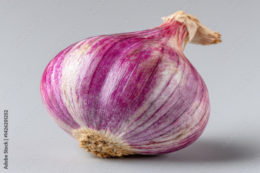 Poster beautifully textured purple onion on a light background showcasing its unique coloration and form