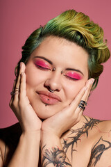 Fototapeta premium A confident woman with colorful hair and bold makeup poses elegantly, radiating self love.