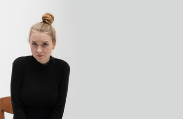 Copy space photo of cute blond young girl. Unconfident, modest and shy, standing hesitating to ask...