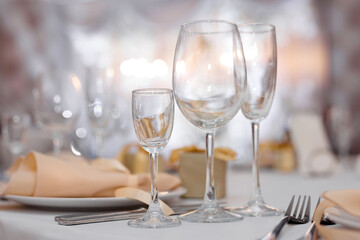 A detail of the wedding dinner setting. A beautiful napkin on a plate.