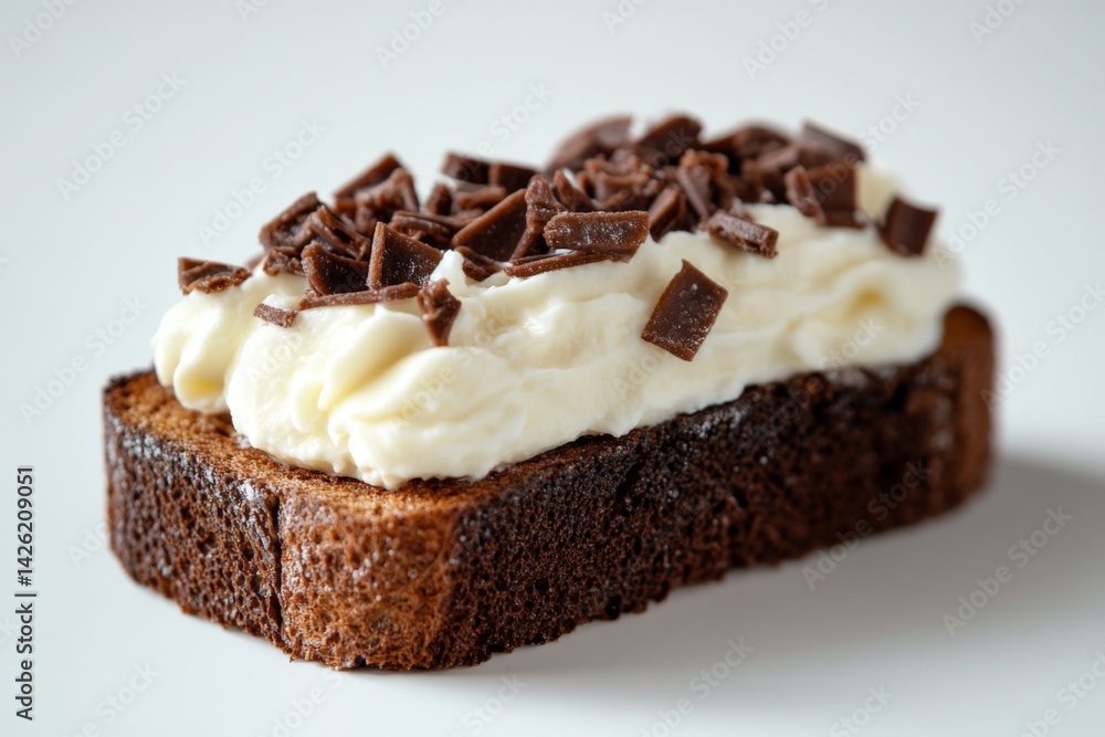Aufkleber Chocolate dessert with cream topping and chocolate shavings on dark bread served in a simple setting