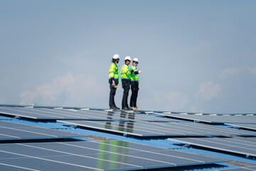 Engineer team installs solar cells check installation solar cell on the roof Sustainable energy industry concept Renewable energy solutions for climate change..