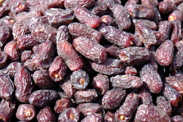 Bulk medjool palm fruit dates at the market stall