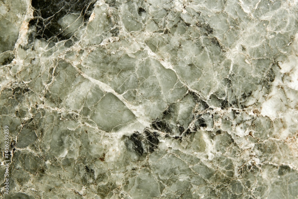 Poster marble stone surface with intricate patterns and textures showcasing shades of gray and black in nat