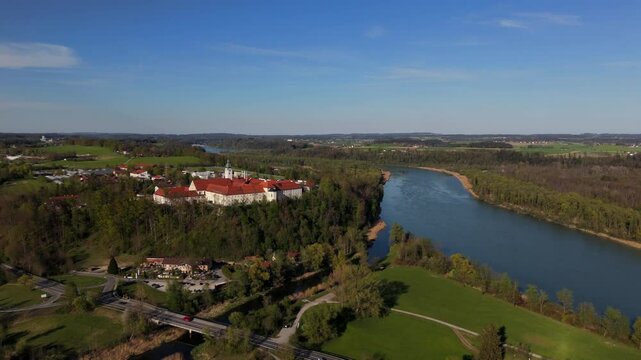 Aerial view Luftaufnahme of Attel Monastery and St. Michael Church on Attel Hill by Inn River, near Wasserburg am Inn, Bavaria. Historic Benedictine site, scenic spring landscape, rural Germany charm