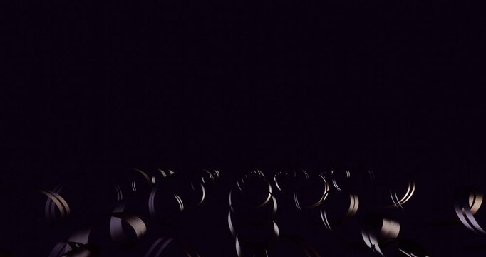 金属の板が回転しながら光に反射するアニメーション