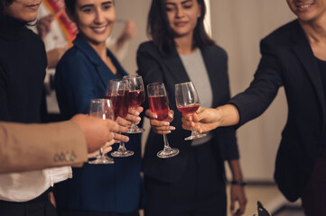Christmas Day Businessman and business partners are successful, fun and happy at a group celebration party.	
