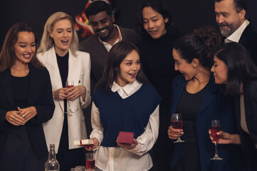 Christmas Day Businessman and business partners are successful, fun and happy at a group celebration party.	
