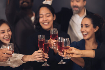 Christmas Day Businessman and business partners are successful, fun and happy at a group celebration party.	
