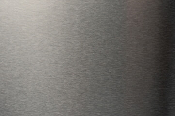 Smooth polished surface of grey alloy