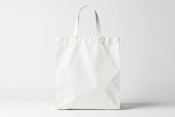 Crisp white cotton shopping bag, handles visible, against pure white backdrop , organic cotton, gift bag, studio