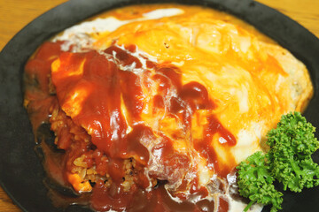 Rice omelet with ketchup and parsley