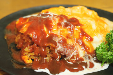 Rice omelet with ketchup and parsley