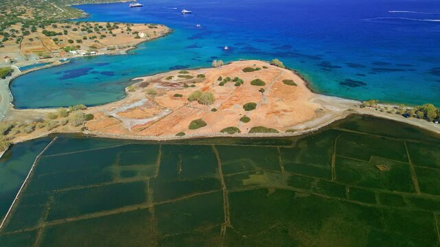 High angle shot of the historic sunken city, Olous in Elounda, Crete.