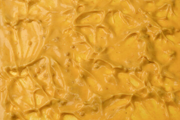 Yellow sauce splashes as a background.