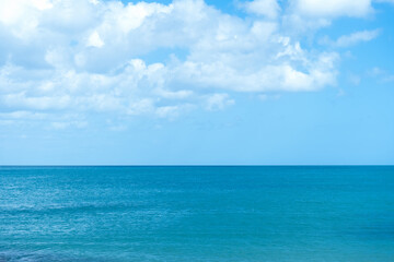 Sky,cloud over blue sea Mediterranean for Summer background,Beautiful Sunny day by seaside beach with calm water waves in Europe.Horizon Seascape in bright colour turquoise water,clear sky in morning