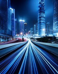 Fototapeta premium Blue Light Trails on City Street at Night. 