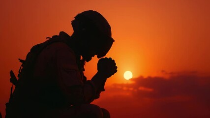 Soldier kneels in solemn prayer at sunset, his silhouette etched against fading light. Between grief for fallen and hope for survival, powerful moment, soldiers silent battle with faith, fear and duty
