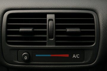 Close-Up View of Car Air Conditioning Vent Control Panel