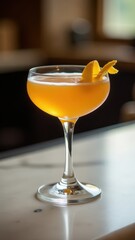 Elegant yellow cocktail with orange peel garnish in stemmed glass on wooden bar counter. Perfect for bar, restaurant, and classic drink concepts.