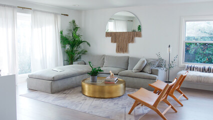 Young Man Wearing Pyjamas Standing At Sink Brushing Teeth In Bathroom