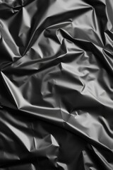 Obraz premium Dark Glossy Crumpled Plastic Texture