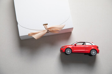 Gift box with a toy car. Present