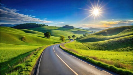 Asphalt road winding through vibrant green rolling hills under a bright sun