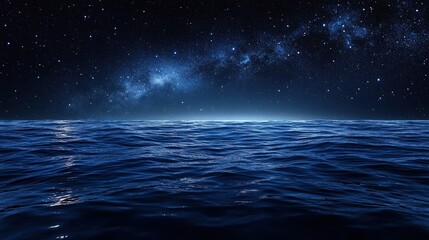 Night sky over a vast ocean