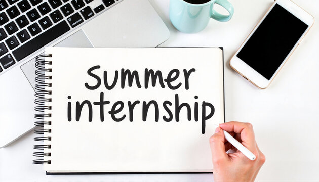 Summer internship notes written on a notepad with a laptop background -  