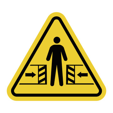 Sign danger of crushing. Risk of crushing between moving objects. Movable mechanisms. Mechanisms with automatic closing. Warning yellow triangle road sign.