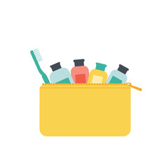 Cosmetic bag with toiletries and a toothbrush for travel and personal care essentials