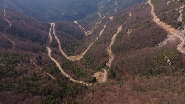 Aerial sweep over Vercors pass with view of marly hills. Aerial drone video