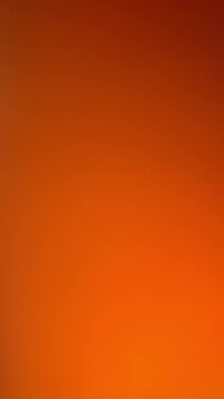 Energetic Orange Backdrop: Warm Tone Gradient Resembling Sunset