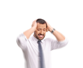 Stressed man with headache and vertigo feeling dizzy