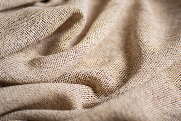 Folded Rustic Fabric with Visible Weave Natural Beige Textile Texture