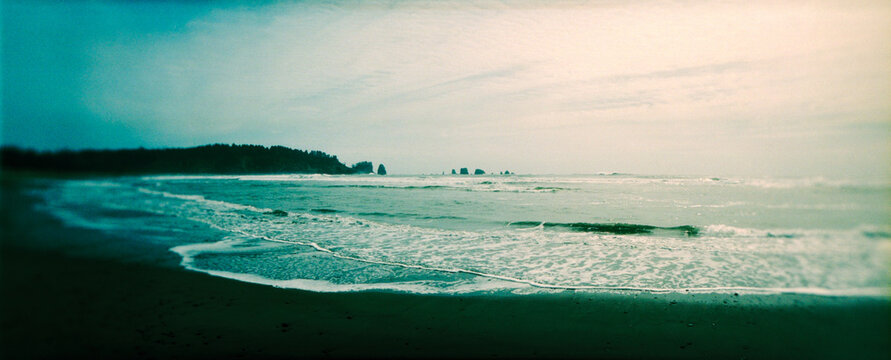 Panoramic view of tides on the beach, La Push Beach, Olympic Peninsula, Washington State, USA.