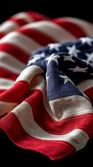 Close Up of Draped American Flag Captured in Studio Textile Art Black Background High-Contrast Viewpoint