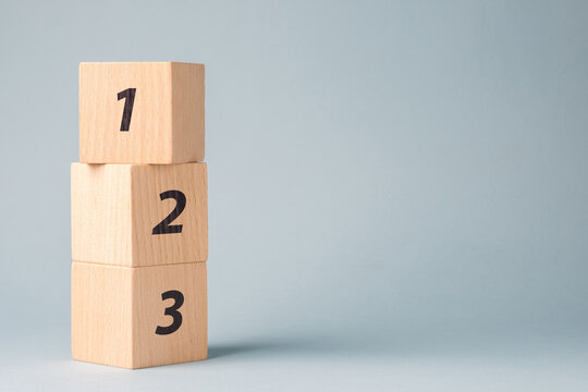 One, two, three, number wood blocks, step-by-step process, instructions, and procedure concept