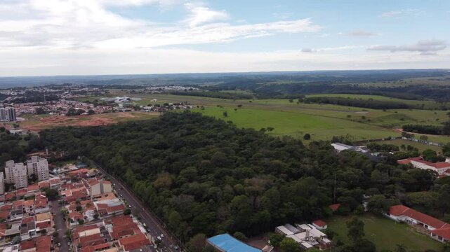 Aerial view of the city of Marilia, inland Sao Paulo, showing the municipal forest and the airport in the background.
