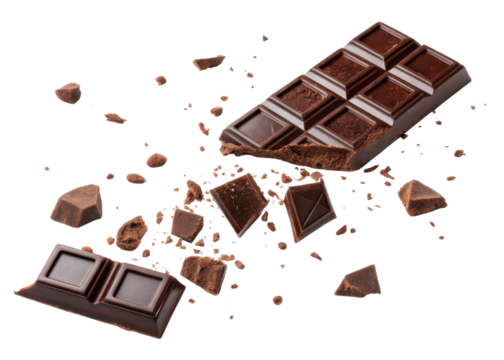 Falling pieces of chocolate create delightful mess with scattered chunks and crumbs