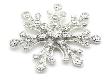 Ornate snowflake brooch adorned with sparkling crystals.